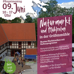 Auf dem Bild Werbung für den Mühlentag mit Mühle im Hintergrund und Text